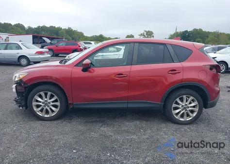 2013 Mazda Cx-5 Grand Touring z USA, uszkodzony, nr VIN JM3KE4DE4D0163853